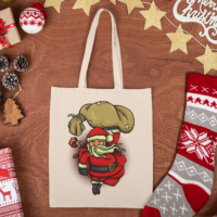 mockup-of-a-tote-bag-placed-on-a-wooden-surface-with-christmas-items-m34 (3)